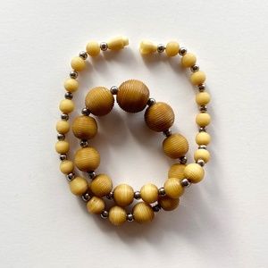 Vintage Plastic Necklace with Gold Carved Beads